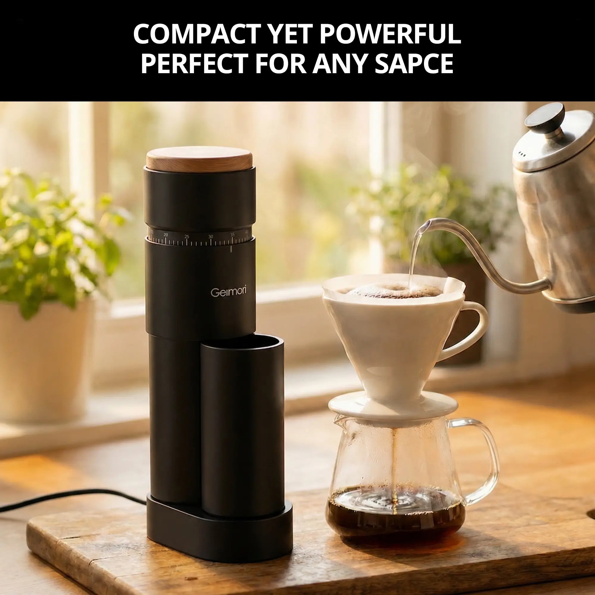 A compact black Geimori T38 Plus coffee grinder sits on a wooden tray next to a pour-over setup with a white cone filter and glass carafe, with hot water being poured from a metal kettle. A black banner at the top reads 'COMPACT YET POWERFUL PERFECT FOR ANY SAPCE'.