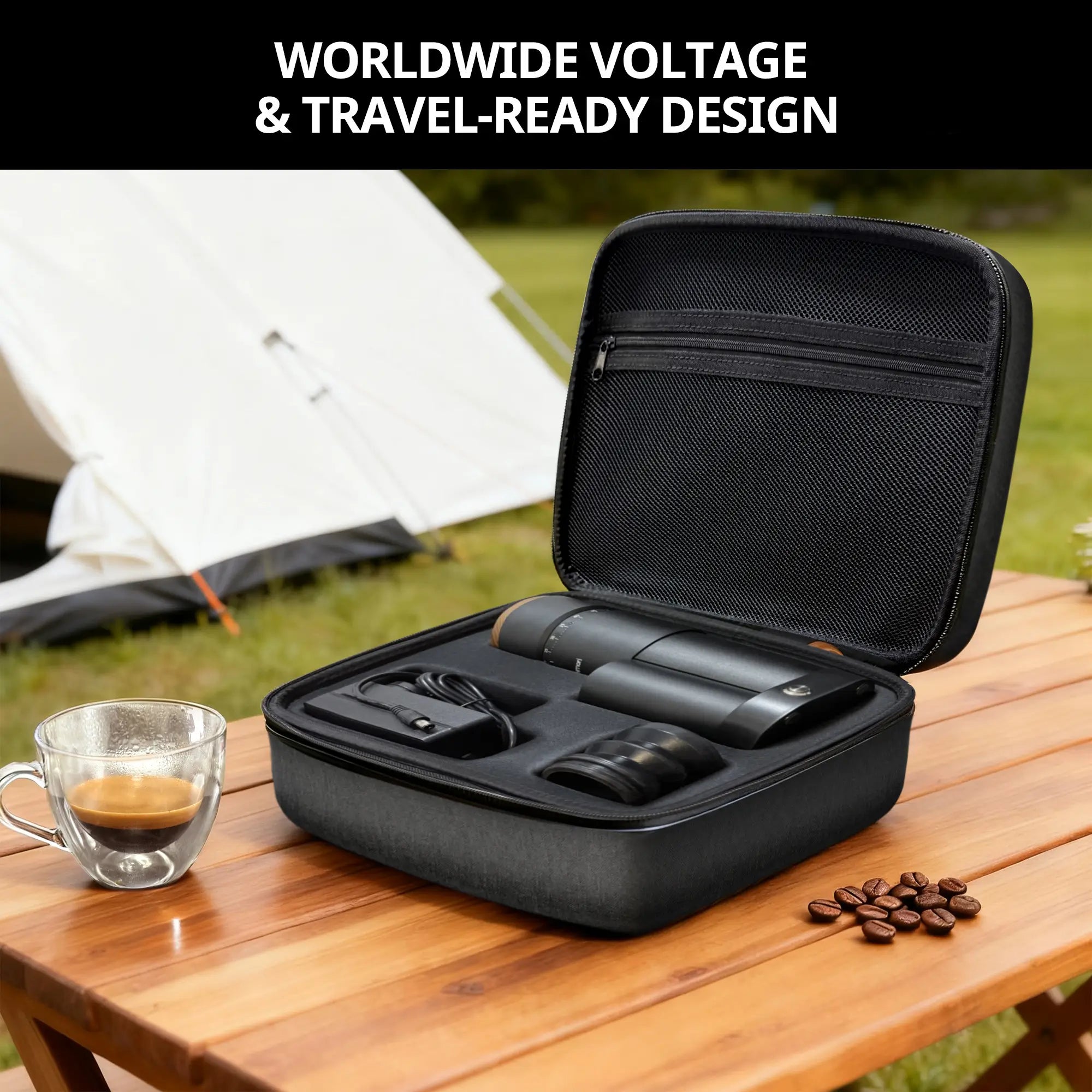 A black carrying case opened on a wooden table outdoors, with Geimori T38 Plus coffee grinder inside. A white tent, grass, and a coffee cup are in the background, with the text 'WORLDWIDE VOLTAGE & TRAVEL-READY DESIGN' at the top.